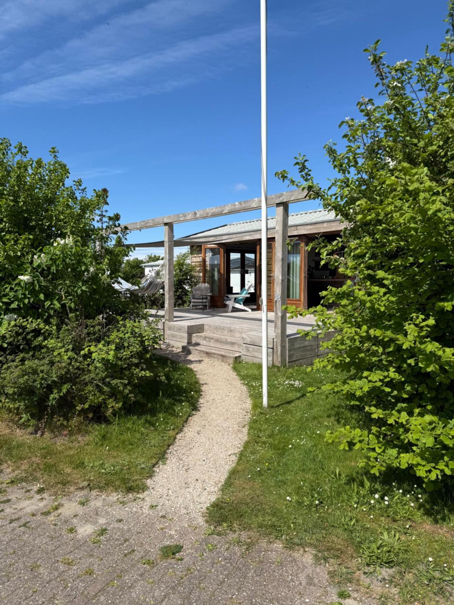 Strandvakantiehuisje! Воркум Экстерьер фото